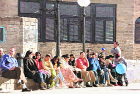 People enjoying the sun in cold weather at Shimla. 