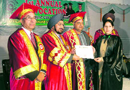 Panjab University Registrar Prof SS Bari confers degree on a student during the convocation of the Gobindgarh Public College on Saturday.