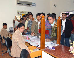 Visitors submitting applications at a counter in the Suvidha Centre, Abohar