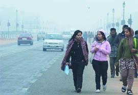 Delhiites brave the cold on Sunday.