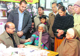 A doctor examines patients during a camp in Ludhiana on Sunday.