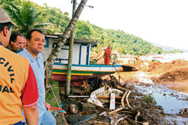 Rescue workers search for victims of the landslide that destroyed the Sankay Hotel in Angra Dos Reis on Saturday. 