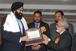 MD of the Baba Farid Group of Institutions GS Dhaliwal presents a memento to chief guest Manmeet Singh Bhullar (left) at a seminar held on college campus in Bathinda on Monday. 