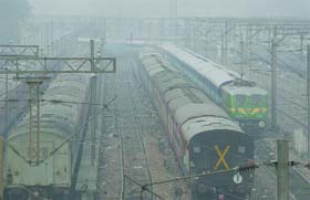 A blanket of fog covered New Delhi railway station in New Delhi