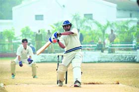 A batsman attempts a hook shot during a match at the 58th District Cricket League in Dehradun
