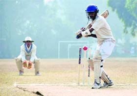 A batsman faces a delivery during the u-17 District Cricket League in Dehradun