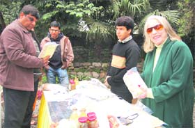 Mona Schwartz with organic stuff displayed on the lawn of her house in Dehradun