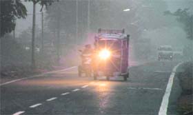 A view of Haridwar Road in the morning on Monday when vehicles moved with their headlights