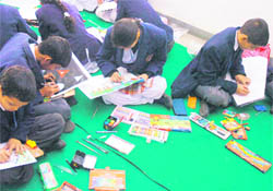 A painting competition held in connection with Traffic Week in Jammu on Monday.