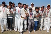 Team members of the Punjabi University in jubilant mood after winning the North Zone Inter University Cricket Tournament in Bathinda