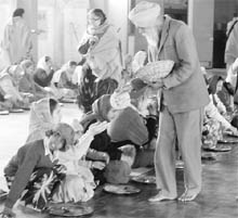 Devotees partake langar on the occasion of the birth anniversay of Guru Gobind Singh at Gurdwara Moti Bagh in Patiala on Tuesday. 