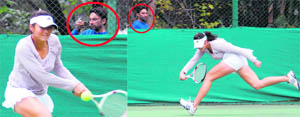 An unknown man secretly videographs a female tennis player, Zi Yang, of China from Leisure Valley, thereby distracting her many a time, during a match of the ITF Grade 3 World Ranking Tennis Tournament in Chandigarh on Tuesday. The trespasser followed her even during the shift of court with no one keeping a check on his activities.