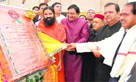 Union Minister Subodh Kant Sahay with Yoga Guru Swami Ramdev, Uttarakhand CM Ramesh Pokhriyal Nishank, Himachal Pradesh CM Prem Kumar Dhumal, Madhya Pradesh CM Shiv Kumar Chauhan, Acharya Bala Krishan at the opening of a food park in Haridwar on Tuesday.