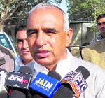 Congress MLA Sampat Singh speaks to mediapersons at Sirsa on Monday.