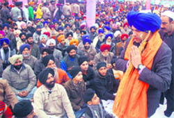 Chief Minister Omar Abdullah greets devotees after getting siropa during the Gurpurab celebrations in Jammu on Tuesday.