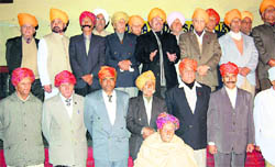 participants at a Dogri turban-tying competition in Dogra Hall, Jammu.