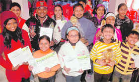 Winners of the chess championship are all smiles after winning trophies in Chandigarh on Wednesday. 