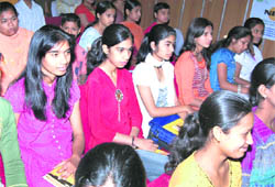 Students at a seminar on environmental conservation at SMJN College in Haridwar.