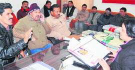 A delegation of Unani and ayurvedic employees talk to Pujan Bhardwaj, Director, Ayurveda and Unani Medicine, in Dehradun on Wednesday.