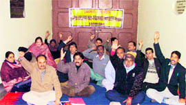 Non-teaching employees of Arya College stage dharna in Ludhiana on Wednesday