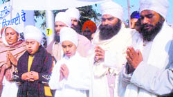Followers of Baba Pritpal Singh queue up in front of the courts complex in Chandigarh on Thursday.