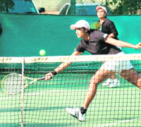 A tennis match in progress at the CLTA in Chandigarh on Thursday. 