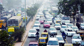 A view of the heavy traffic jam at Mathura Road due to the ongoing Auto Expo in New Delhi on Thursday.