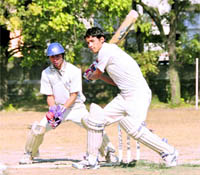 A batsman attempts a cut in a match of the Dehradun District Under-17 District Cricket League in Dehradun on Thursday