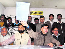 Anjay Verma, a Shiv Sena leader, addresses a press conference in Dehradun on Thursday
