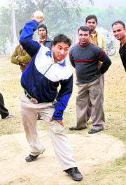 A player participates in the shot put competition during the district-level paralympic games in Karnal on Thursday.