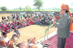 Finance Minister Ajay Singh Yadav addresses meeting in Rewari 