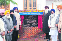 Ajmer Singh Lakhowal and Sharanjit Singh Dhillon lay the foundation stones of a few projects in Sahnewal on Thursday.