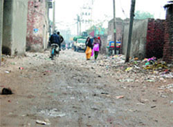 Important but neglected: A view of a battered road, which connects many localities, in Ward 19. 