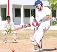 Batsman tries to cut the ball during a match at the u-17 District Cricket League in Dehradun
