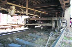 The derailed coach of Howrah Express at the Dehradun railway station 