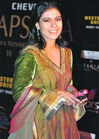 Bollywood actress Kajol poses for a picture at the Apsara awards ceremony in Mumbai