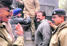 Devinder Singh Babla being produced at the district courts in Chandigarh on Saturday. 