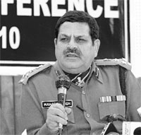 DIG Mahabir Singh at a press conference in Chandigarh on Saturday.