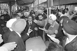 Advocates exchange words on the last day of the withdrawal of nomination for the elections to the Mohali District Bar Association at the district courts in Mohali on Saturday.