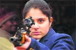 A girl curiously looks into a weapon being displayed by the Army during the two-day Know Your Army exhibition at Satwari in Jammu on Saturday.