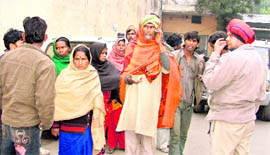 Relatives of the deceased outside hospital in Ludhiana on Saturday.