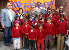 Mahavir International workers after distributing woollens to the students of a rural school in Suratgarh sub-division.