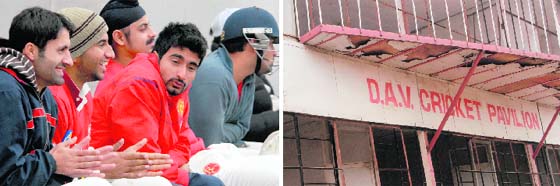 National-level players of Kings XI (Punjab) shiver in cold in the absence of windowpanes (right) at the cricket pavilion of the stadium at DAV School, Chandigarh