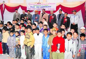 The participants pose for a group picture at the concluding day of the winter camp at Strikers Sports Academy in Dehradun