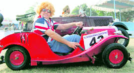An enthusiast at the vintage car rally in Kolkata on Sunday.
