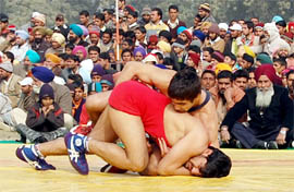 A match in progress during daylong Bhai Maha Singh Gold Cup Championship at the Guru Nanak Girls Collegein Muktsar on Monday.