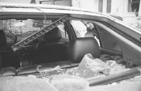 Shinder Singh shows his damaged car in Mohali 