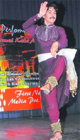 Kathak exponent Pandit Rajender Gangani strikes a dancing pose during a performance at the NDRI auditorium in Karnal