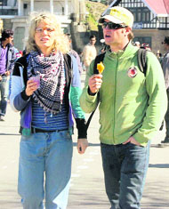 Two foreign tourists having a stroll in a sunny weather on the Ridge at Shimla on Monday.
