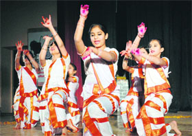 Students give a performance at a dance competition in Jammu on Monday.